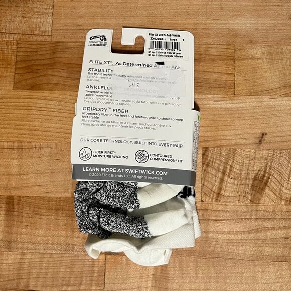 New Men's Large Swiftwick Flite XT Tab No Show Grip Socks White - Picture 2 of 2